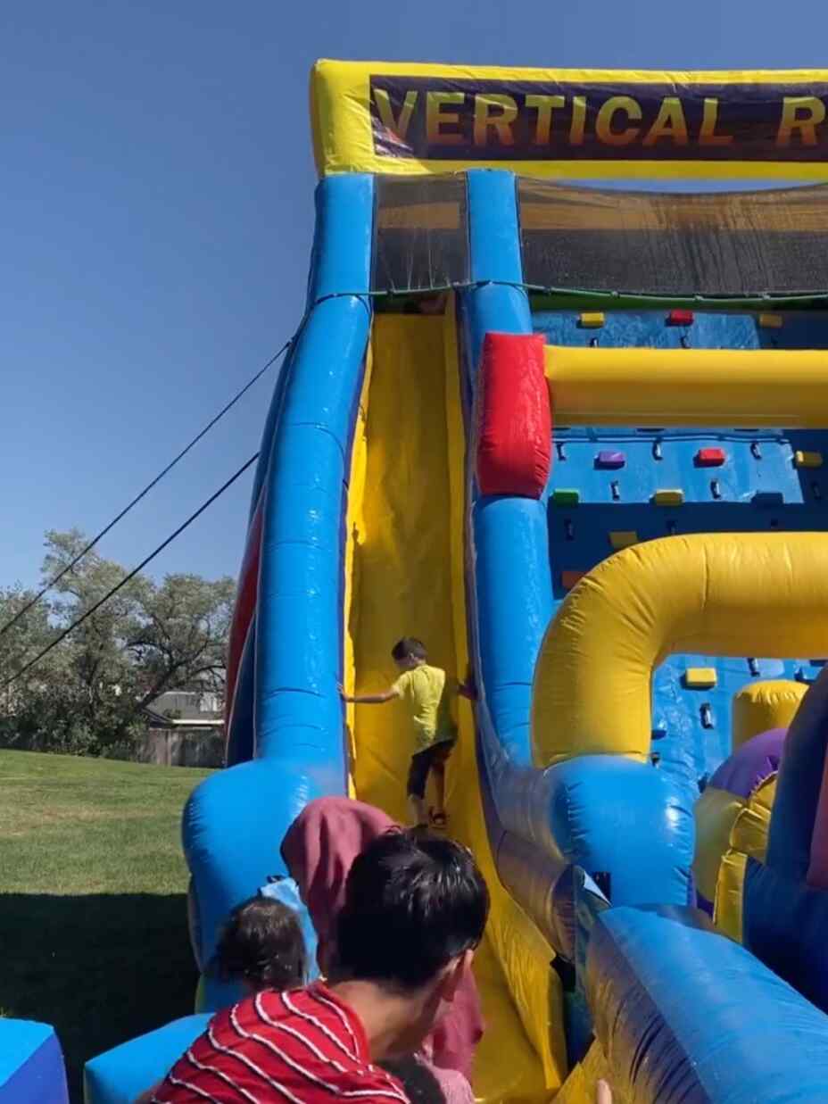 Bouncin Bins Utah brings joy to refugee families through inflatable